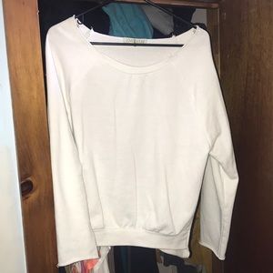 Back cut out, heart shaped sweater